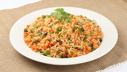 Veg Schezwan Fried Rice Vegetarian Szechuan Rice is indo-chinese cuisine dish with bell peppers, green beans, carrot.
