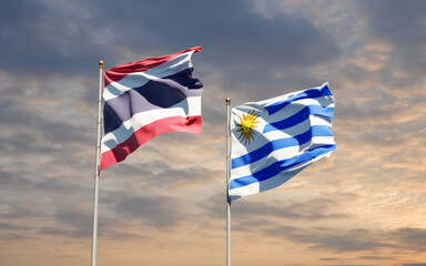 Flags of Uruguay and Thailand.