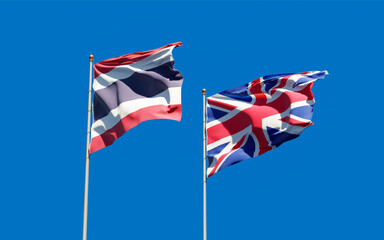 Flags of UK and Thailand.