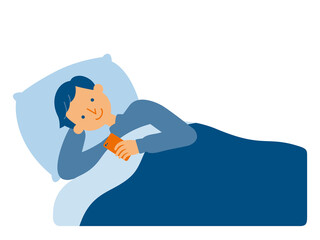 ふとんでスマホを操作する男性