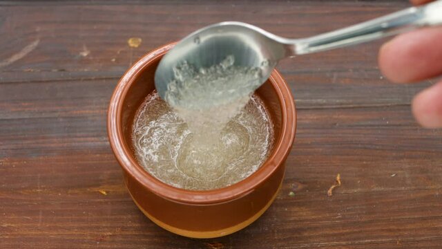 A tablespoon of psyllium husk, hydrated plantago ovata, superfood for intestinal health