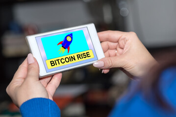 Bitcoin rise concept on a smartphone