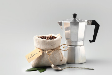 Composition with coffee bag on white background