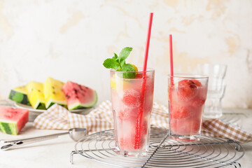 Glasses of tasty watermelon cocktail on table