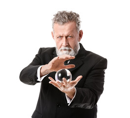 Male fortune teller with crystal ball on white background