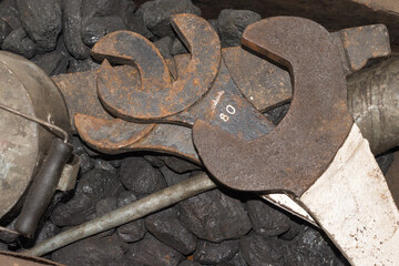 Antique large rusty wrenches. Old locomotive train toolset with heavy-duty spanners used in railway maintenance