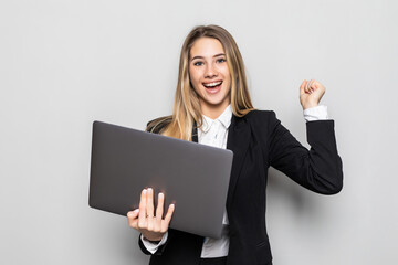 Naklejka premium Attractive beautiful businesswoman get successful of business. Charming beautiful woman hold laptop and looking some information of business.