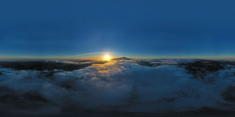 360 degree virtual reality panorama of sunrise above the clouds with view of Etna volcano, Sicily, Italy.
