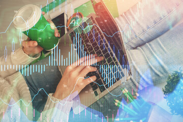 Double exposure of woman hands typing on computer and forex chart hologram drawing. Stock market invest concept.