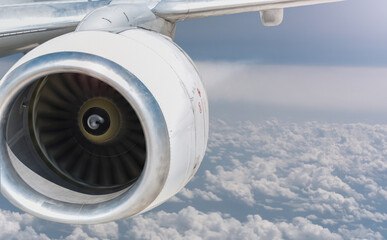 View of the turbine of a flying aircraft. Concept travel on airplane. 