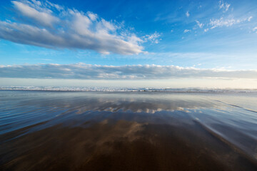 Clouds reflected on Beach