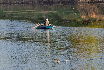 Traditional egyptian bedouin fisherman on river