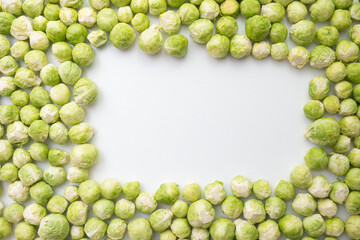 peeled and ripe brussels sprouts scattered on the table