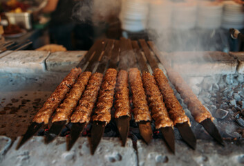 Traditional Turkish grilled shish kebab or kebap. Delicious Adana kebab in Turkish Restaurant