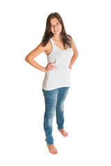 Full length portrait of a gorgeous smiling woman wearing blue jeans and white top, isolated on white studio background