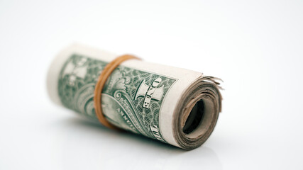 roll of dollar bills banknotes white background close