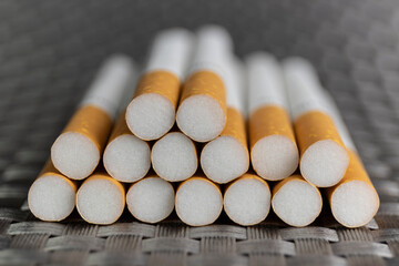 Cigarette close-up. Quitting smoking is the single easiest way to avoid heart disease.