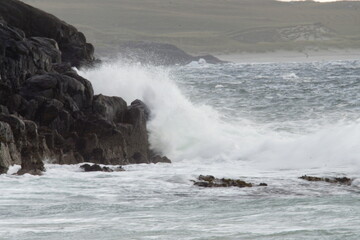 waves crashing on rocks