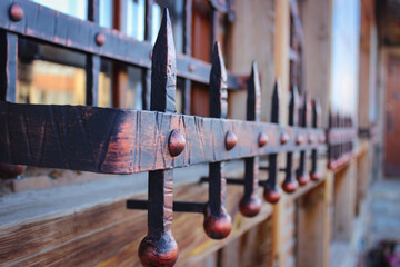 Metal forged grating on windows.
