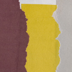 Colorful torn paper collage close-up. Texture made from various paper and cardboard parts. Damaged...
