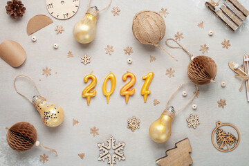 Christmas handmade background. Female hands making paper decoration balls.  DIY accessories on table. Top view. Zero waste concept.