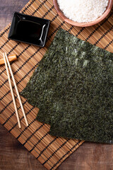 Nori leaves. Crunchy dried seaweed. Japanese traditional cuisine  © Liudmila Zavialova