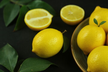 Group of lemons with leaves, isolated on background