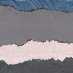 Colorful torn paper collage close-up. Texture made from various paper and cardboard parts. Damaged...