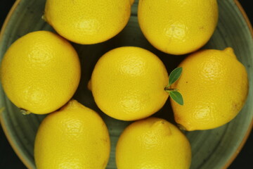 Group of lemons with leaves, isolated on background