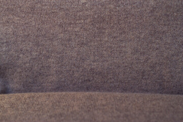 Fototapeta premium warm wool textile background - close up, with place for stnding, winter warm clothes and cute natural home decoration
