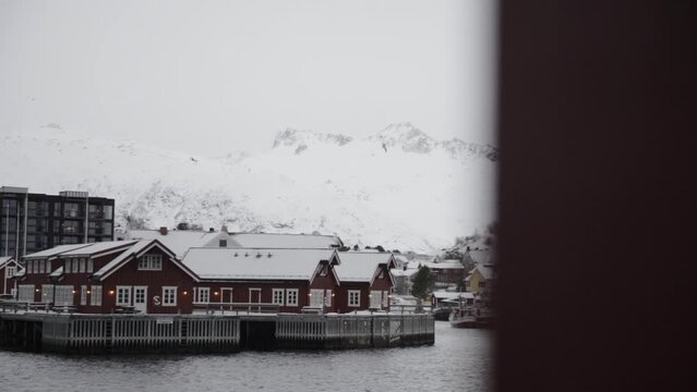 Nordic village in winter landscape