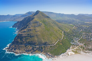 Cape Town, Western Cape, South Africa - 12.22.2020: Aerial photo of Noordhoek Beach and Peak, with Chapmans Peak in the background
