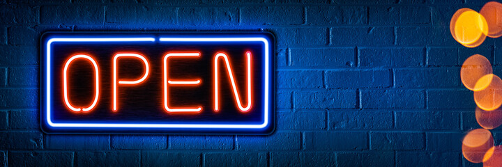 Neon Open Sign On Brick And Mortar Storefront - Shop Local Concept