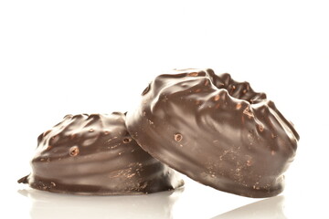 Delicious chocolate marshmallow, close-up, isolated on white.
