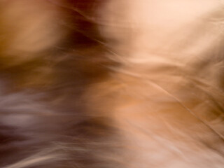 Obraz premium Ocker, brauner leuchtender Hintergrund