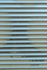 Obraz premium Window shutters painted with paint, urban background, pattern