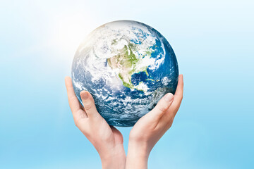 Earth globe in hands. World environment day