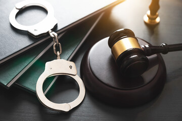 Crime and violence concept with handcuffs