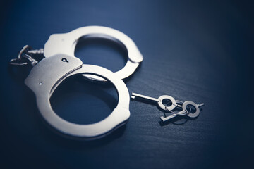Crime and violence concept with handcuffs