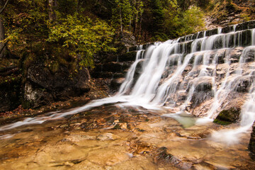 Fototapeta premium clearr waterfall in motion at autumn Germany nature