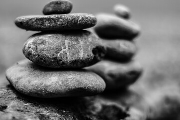 Balance stone on lake coast. Symbol of relax