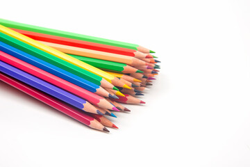 set of colored pencils for drawing on a white background. marketing in business sales