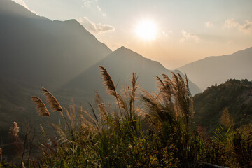 Sun setting over the majestic mountains of Hoang Lien National Park near Sapa in northern Vietnam