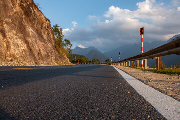 Asphalt highway winding its way through the mountains of  Hoang Lien National Park near Sapa in northern Vietnam