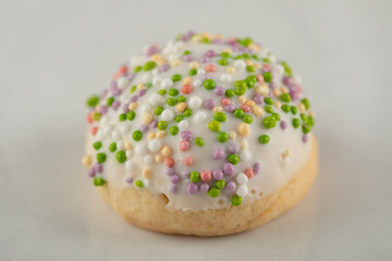 Colorful sweet small doughnut with sprinkles