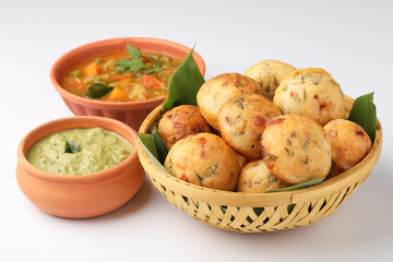 Kuzhi Paniyaram served with coconut chutney and sambar- South Indian breakfast