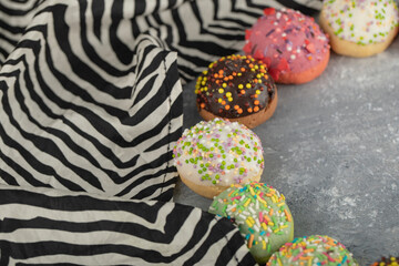 Colorful sweet small doughnuts with sprinkles