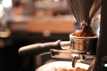 Close up image of temper coffee. Grinded coffee
