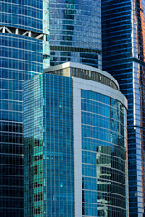 Fototapeta na wymiar Skyscrapers abstract background, parts of different modern buildings for business, city architecture, construction industry 