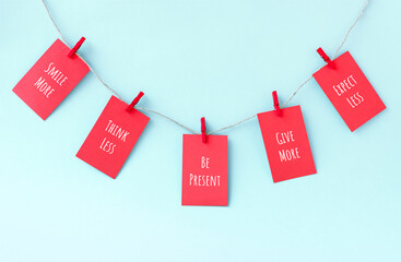 Five tips of happiness and well-being on hanging paper